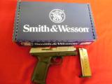 SMITH & WESSON
SD9-VE,
9 - MM,
2 - 16 + 1
ROUND
MAGAZINES,
STAINLESS
STEEL
N.I.B. - 1 of 14