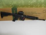 MOSSBERG
715-T ,
AR--15
STYLE
22 L.R.
WITH
RED
DT.
SCOPE,
FRONT
HAND
GRIP
&
25
ROUND
MAG - 1 of 15