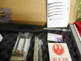 RUGER
K10 / 22,
TACTICAL
MODEL
# 11126
STAINLESS
STEEL,
25
ROUND
MAG.
FACTORY
NEW
IN
BOX - 2 of 19