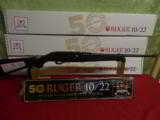 RUGER
10 / 22
COLLECTOR,
MODEL # 21105,
WITH
3- 10
ROUND
MAGAZINES, FIBER
OPTIC SIGHTS, NEW IN BOX - 3 of 15