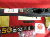 RUGER
10 / 22
COLLECTOR,
MODEL # 21105,
WITH
3- 10
ROUND
MAGAZINES, FIBER
OPTIC SIGHTS, NEW IN BOX - 11 of 15