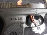 RUGER
L.C.P.
ALL
NEW
380
CUSTOM ,
COMES WITH A
WIDE RED
SKELTONIZED ALUMINUM TRIGGER,
NEW
IN
BOX - 5 of 16