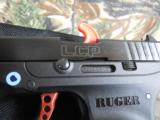 RUGER
L.C.P.
ALL
NEW
380
CUSTOM ,
COMES WITH A
WIDE RED
SKELTONIZED ALUMINUM TRIGGER,
NEW
IN
BOX - 4 of 16