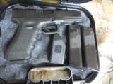 GLOCK
G - 22,
GEN. 3,
COMBAT
SIGHTS,
COMES
WITH
3- 15
ROUND
MAGAZINES,
ALMOST
NEW
- 1 of 15