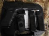 GLOCK
G - 22,
GEN. 3,
COMBAT
SIGHTS,
COMES
WITH
3- 15
ROUND
MAGAZINES,
ALMOST
NEW
- 2 of 15