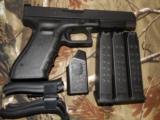 GLOCK
G-35
M.O.S.
THE
ALL
NEW
OPTIC
GLOCK
GUN,
40
S & W,
3 - 15
ROUND
MAGS,
NEW
IN
BOX - 3 of 11