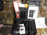 GLOCK
G-34
M.O.S.
GEN. 4,
9 - MM,
WITH
3 - 10
ROUND
MAGAZINES,
GUN
GOOD
IN
MOST
STATES
NEW
IN
BOX - 4 of 15
