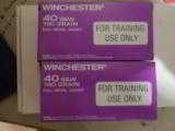 WINCHWSTER
40
S & W
180
GRAIN
F.M.J.
TRAINING
USE
ONLY
AMMO, - 2 of 11
