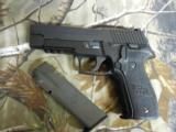 SIG
SAUER
P226
9-MM
PRE
OWNED
2 - 15
ROUND
MAGS,
NIGHT
SIGHTS
REAL
NICE
GUN - 4 of 15