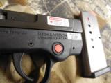 SMITH & WESSON
M & P
BODY
GUARD
380 A.C.P.
WITH
LASER,
2 -
6 + 1
ROUNDS
MAGAZINES
NEW
IN
BOX - 6 of 15