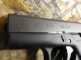 GLOCK
G - 42
380
A.C.P.
2 - 6
RD. MAGS,
AS
CLOSE
TO
NEW
AS
YOU
ARE
GOING
TO
GET,
FIRED
ONLY
45
THMES,
HAS CASE
&
ALL
PAPERS - 6 of 25