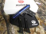 RUGER
LITE,
22 / 45
22
L.R.
MODEL
03908,
BLUE,
4.4"
BARREL,
2 - 10
ROUND
MAGAZINES,
FACTORY
NEW
IN
BOX
- 9 of 13