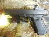 GLOCK
G-34
M.O.S.
THE
OPTIC
SIGHT
GLOCK
GUN,
9 - MM ,
3 - 17
ROUND
MAGS,
NEW
IN
BOX
FREE 33 RD.MAG W/ GUN - 9 of 26