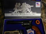 HARITAGE
ROUGH
RIDER,
22L.R. / 22 MAGNUM
COMBO,
9
SHOT
REVOLVER,
COMES
WITH
TWO
CYLINDERS,
FACTORY
NEW
IN
BOX - 12 of 17