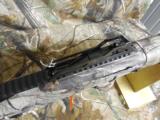 HI-POINT,
9 - MM
CARBINE
WOODLAND
CAMO,
ADJUSTABLE
SIGHTS
10
ROUND
MAGAZINE,
FACTORY
NEW
IN
BOX
- 6 of 22