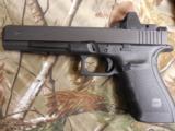 GLOCK
G-40
M.O.S.
THE
ALL
NEW
OPTIC
GLOCK
GUN,
10 -
MM,
3 - 15
ROUND
MAGS,
WITH
TRIJICON
RMR
R.D.
SIGHT
NEW
IN
BOX - 6 of 23