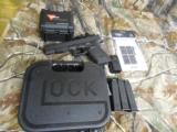 GLOCK
G-40
M.O.S.
THE
ALL
NEW
OPTIC
GLOCK
GUN,
10 -
MM,
3 - 15
ROUND
MAGS,
WITH
TRIJICON
RMR
R.D.
SIGHT
NEW
IN
BOX - 19 of 23