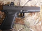 GLOCK
G-40
M.O.S.
THE
ALL
NEW
OPTIC
GLOCK
GUN,
10 -
MM,
3 - 15
ROUND
MAGS,
WITH
TRIJICON
RMR
R.D.
SIGHT
NEW
IN
BOX - 4 of 23