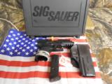 SIG / SAUER
P 250C,
357 SIG,
WITH
FREE
SIG
HOLSTER,
2 -13 + 1
ROUND
MAGAZINE,
COMBAT
SIGHTS,
NEW
IN
BOX - 3 of 17