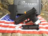 SIG / SAUER
P 250C,
357 SIG,
WITH
FREE
SIG
HOLSTER,
2 -13 + 1
ROUND
MAGAZINE,
COMBAT
SIGHTS,
NEW
IN
BOX - 11 of 17