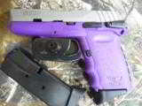 SCCY
INDURSTRIES, CPX-1,
9-MM,
PURPLE,
S / S SLIDE, COMES
WITH TWO
TEN
ROUNDS
MAGAZINES,
FACTORY
NEW
IN
BOX !!!! - 3 of 21