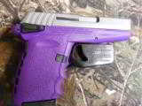SCCY
INDURSTRIES, CPX-1,
9-MM,
PURPLE,
S / S SLIDE, COMES
WITH TWO
TEN
ROUNDS
MAGAZINES,
FACTORY
NEW
IN
BOX !!!! - 5 of 21