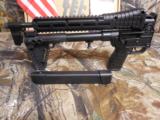 KEL-TEC
SUB
2000,
40
S&W,
2K40GLK22
FACTORY NEW
IN
BOX,
USES
GLOCK
MAGAZINES,
1-15
ROUND
MAG
&
1 FREE - 31
ROUND
MAG
- 17 of 21