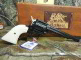 HERITAGE
R.R.
22
L. R.
REVOLVER,
6
SHOT,
WHITE
GRIPS,
6.5"
BARREL,
FACTORY
NEW
IN
BOX - 10 of 15