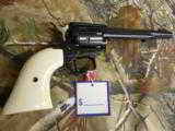 HERITAGE
R.R.
22
L. R.
REVOLVER,
6
SHOT,
WHITE
GRIPS,
6.5"
BARREL,
FACTORY
NEW
IN
BOX - 5 of 15
