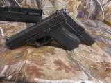 GLOCK
G-22,
GENERATION
2
PRE
OWNED,
FIXED
SIGHTS,
2- 15
ROUND
MAGS,
HARD
PLASTIC
CASE,
GOOD
SHOOTER
- 8 of 16