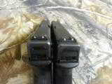 GLOCK
G-22,
GENERATION
2
PRE
OWNED,
FIXED
SIGHTS,
2- 15
ROUND
MAGS,
HARD
PLASTIC
CASE,
GOOD
SHOOTER
- 4 of 16