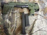 KEL-TEC
GREEN
SUB
2000,
GEN # 2
9-MM,
GLOCK
G-17,
1-17
ROUND
MAG
&
1
FREE - 33
ROUND
MAG,
FACTORY
NEW
IN
BOX
- 15 of 23