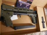 KEL-TEC
GREEN
SUB
2000,
GEN # 2
9-MM,
GLOCK
G-17,
1-17
ROUND
MAG
&
1
FREE - 33
ROUND
MAG,
FACTORY
NEW
IN
BOX
- 2 of 23