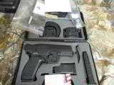 CANIK
TP9SA
9 - MM
( BY
CENTRUY ARMS ),
2 - 18
ROUND
MAGAZINES,
HOLSTER,
COMBAT
SIGHTS,
FACTORY
NEW
IN
BOX
- 13 of 22