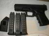 GLOCK
G- 19,
GENERATION
4,
9-MM
COMBAT
SIGHTS,
3 -15 -
ROUND
MAGAZINES, FACTORY
NEW
IN
BOX - 10 of 21