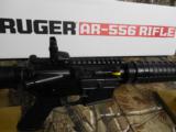RUGER
AR-556,
AR-15 TYPE
RIFLE,
223 / 5.56
NATO,
30
ROUND
MAGAZINE,
POP - UP
REAR
SIGHT,
SLIDE B STOCK,
FACTORY
NEW
IN
BOX
- 4 of 24