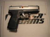 KAHR
CT9,
TACTICAL
9 - MM,
7+1
ROUNDS,
STAINLESS
STEEL
/
BLACK,
COMBAT
SIGHTS,
HAS
A
$45.00, FACTORY
NEW
IN
BOX - 11 of 18