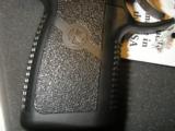 KAHR
CT9,
TACTICAL
9 - MM,
7+1
ROUNDS,
STAINLESS
STEEL
/
BLACK,
COMBAT
SIGHTS,
HAS
A
$45.00, FACTORY
NEW
IN
BOX - 9 of 18