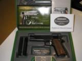 REMINGTON
1911
R1,
45 A.C.P.
WALNUT
GRIPS,
2 - 7
ROUND
MAGAZINES,
5.0"
BARREL,
BLUED,
FACTORY
NEW
IN
BOX
- 2 of 15