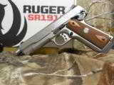RUGER
SR1911
STAINLESS
STEEL
45
A.C.P.
2-8+1 RD. MAGAZINES, HARDWOOD
GRIPS,
FACTORY
NEW
IN
BOX - 19 of 25