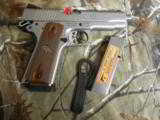 RUGER
SR1911
STAINLESS
STEEL
45
A.C.P.
2-8+1 RD. MAGAZINES, HARDWOOD
GRIPS,
FACTORY
NEW
IN
BOX - 11 of 25