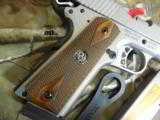 RUGER
SR1911
STAINLESS
STEEL
45
A.C.P.
2-8+1 RD. MAGAZINES, HARDWOOD
GRIPS,
FACTORY
NEW
IN
BOX - 16 of 25