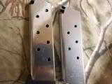 RUGER
SR1911
STAINLESS
STEEL
45
A.C.P.
2-8+1 RD. MAGAZINES, HARDWOOD
GRIPS,
FACTORY
NEW
IN
BOX - 9 of 25