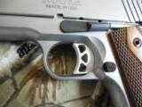 RUGER
SR1911
STAINLESS
STEEL
45
A.C.P.
2-8+1 RD. MAGAZINES, HARDWOOD
GRIPS,
FACTORY
NEW
IN
BOX - 8 of 25