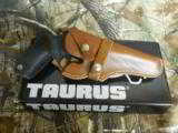 TAURUS
JUDGE,
STAINLESS
STEEL,
45 LONG / 410,
3.0" BARREL,
CRIMSON
TRACE
LASER,
LEATHER
HOLSTER,
ALL
FACTORY
NEW
IN
BOX - 10 of 25