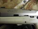 SCCY
INDURSTRIES,
CPX-2,
9-MM,
WHITE /
STAINLESS
STEEL
COMPACT,
3.1"
BARREL,
TWO
10+1
RD.
MAGAZINES,
FACTORY
NEW
IN
BOX - 5 of 24