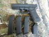 GLOCK
G-22C
GEN.
3,
PORTED
BARREL,
2-15
ROUND
MAGS,
&
1
FREE
15
ROUND
MAG.,
MAG
LOADER.
HAVE
TWO
WITH
CONSECUTIVE
#s
NEW IN BOX - 5 of 20