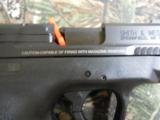S&W M&P 45 SHIELD .45ACP FSBLACKENED SS / BLACK POLYMER,NEW,1-7ROUND&1-6ROUNDWTTHTHUMBSAFETY,N.I.B. - 8 of 25