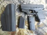 GLOCK
G - 43
9 - MM
WITH
CRIMSON
TACE
LASER,
BLADE - TECH
HOLSTER,
FREE
BATTERIES
FOR
LIFE,
ALL
FACTORY
NEW
IN
BOX - 4 of 25