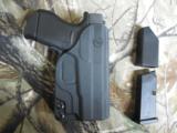 GLOCK
G - 43
9 - MM
WITH
CRIMSON
TACE
LASER,
BLADE - TECH
HOLSTER,
FREE
BATTERIES
FOR
LIFE,
ALL
FACTORY
NEW
IN
BOX - 15 of 25